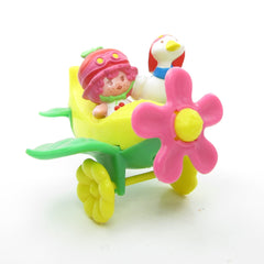Cherry Cuddler and Gooseberry in an airplane Strawberry Shortcake miniature figurine set