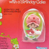 Mint in package Strawberry shortcake with a birthday cake miniature figurine