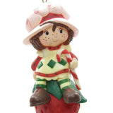 Strawberry Shortcake Berry Merry Christmas ornament with yellowed plastic on dress