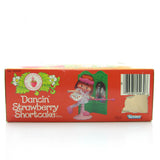 Bottom of Dancin' Strawberry Shortcake doll box with piece cut out