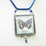 Blue Butterfly Postage Stamp in Soldered Pendant