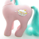 Banana Surprise pony with surface dirt and scuff on symbol