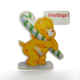 Funshine Bear greetings with green and white striped candy cane