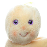 Fluffer Hugga Bunch toy with purple eyes, yellow hair