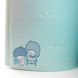 Blue lined Little Twin Stars notebook with image of Kiki and Lala reading