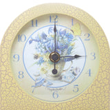 Yellow & purple Marjolein Bastin clock with tea cup and flowers