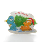 Merry Christmas Wish Friend Bear hauling tree on sled