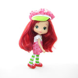 Modern Strawberry Shortcake doll with classic reissue set