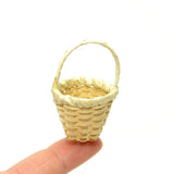 Miniature natural woven straw basket