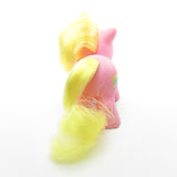 Pink baby Tappy pony with yellow hair