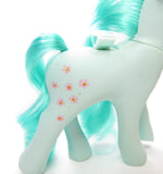 Peach Blossom Flutter Pony with brown pindots on symbol