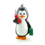 Penguin with cell phone and briefcase Hallmark ornament