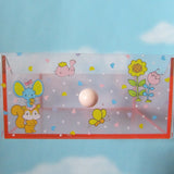 Pink plastic drawer on My Melody box with Flat the mouse, Risu the squirrel, Chocho the butterfly, a pink bird, and flowers