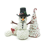 Polymer clay snowman with bushes and red tree figurine