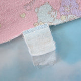Faded tag on Care Bears baby blanket
