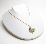 Snowflake and Pine Cone Pendant Necklace