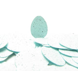 Robin's egg blue paper punches with brown speckles