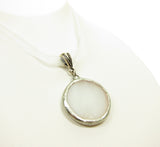 White necklace with stained glass moon pendant