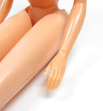 Barbie doll with indentations on hand