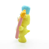 Funshine Bear marching with a magic wand miniature figurine