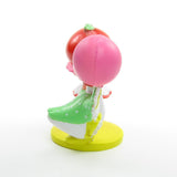 Gooseberry with roller skates and a pink balloon
