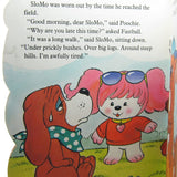 Poochie and SloMo book with dirt on page