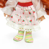 Strawberry Shortcake Berrykin doll with rip in tights