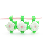 Flower charms for pink plastic necklace
