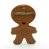 Avon Gingerbread Pin Pal with white icing