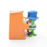 Side view of Blueberry Muffin with Cheesecake at the piano miniature figurine set