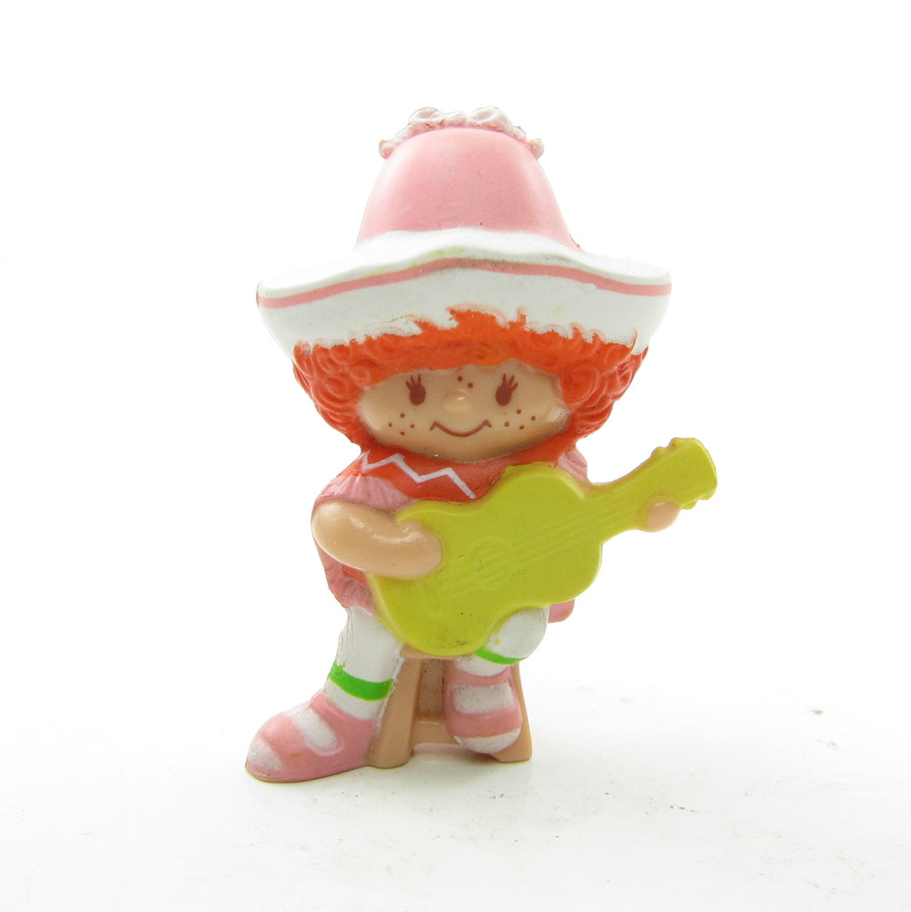 Cafe Ole with a Guitar PVC Miniature Figurine