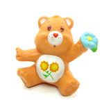 Friend Bear sitting with a flower miniature figurine
