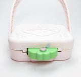 Charmkins Freckle Face toy with blue mark near latch