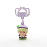 Charmkins Mollyberry charm doll with purple shoelace hanger