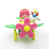 Cherry Cuddler and Gooseberry in an airplane Strawberry Shortcake miniature figurine set