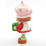 Strawberry Shortcake with a Christmas gift present ornament