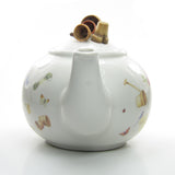 Marjolein Bastin Hallmark teapot with gardening motifs