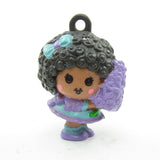 Charmkins Hyacinthia Charmkins charm with purple dress and flower