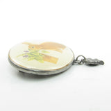 Marjolein Bastin pin with bunny rabbit, violets, and leaf charm