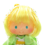 Mint Tulip Party Pleaser Strawberry Shortcake doll with yellow hair, green eyes