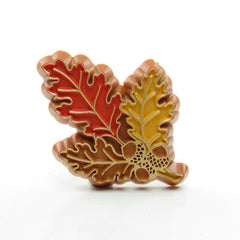Vintage Hallmark lapel pin with oak leaves and acorns