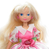 Peppermint Rose doll with blonde hair, blue eyes, pink earrings
