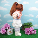 Cabbage Patch Kids Cornsilk doll with red hair in ponytail, curls around face