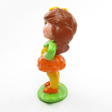 Side view of vintage Avon Scamper Lily Little Blossom doll