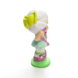 Angel Cake chatting on the phone miniature figurine side view