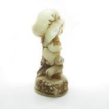 Vintage Hallmark girl with bird, cat and flowers figural candle