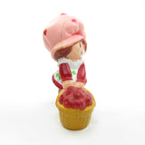 Strawberry Shortcake with a bushel basket miniature figurine