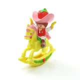 Strawberry Shortcake on a rocking horse deluxe miniature figurine set