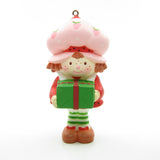 Strawberry Shortcake with a Christmas gift present ornament