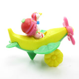 Cherry Cuddler and Gooseberry in an airplane Strawberry Shortcake miniature figurine set